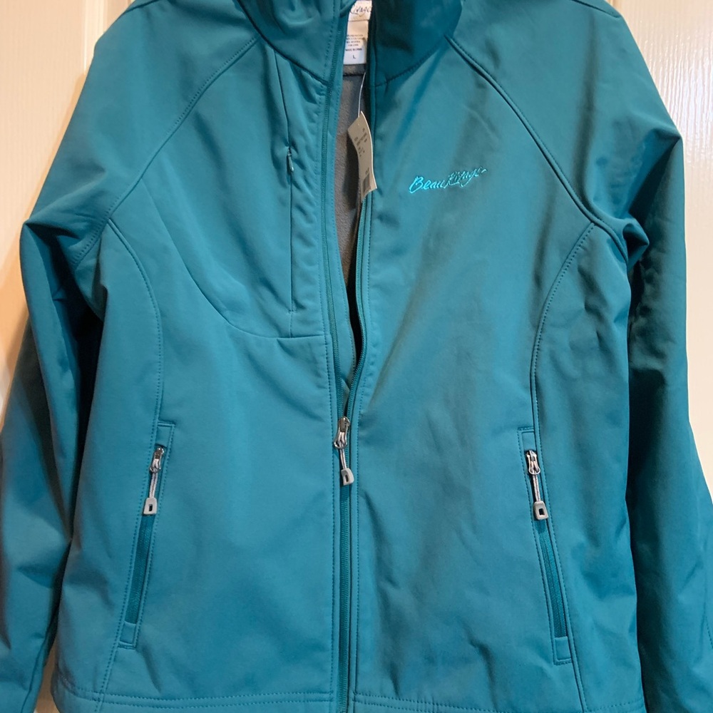 Women’s jacket Size Large.  New with tag.  Blue/gray color.  Zip close